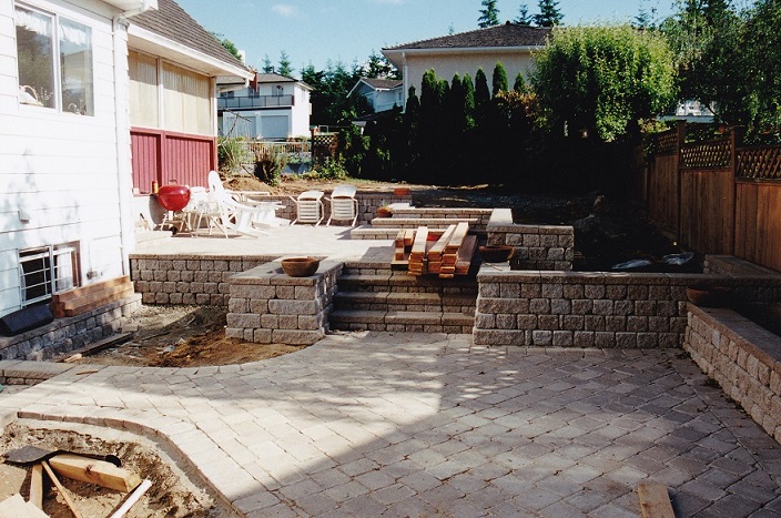 Initial Installation of Walls and Pavers